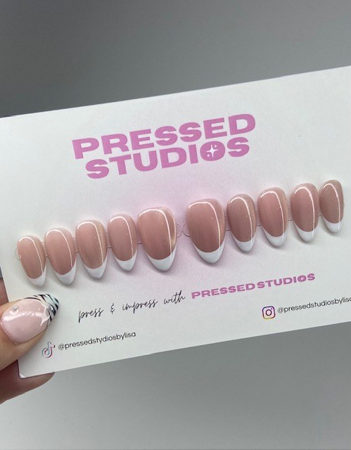 Cat Eye French press-on nail set with a shimmering base and white French tips